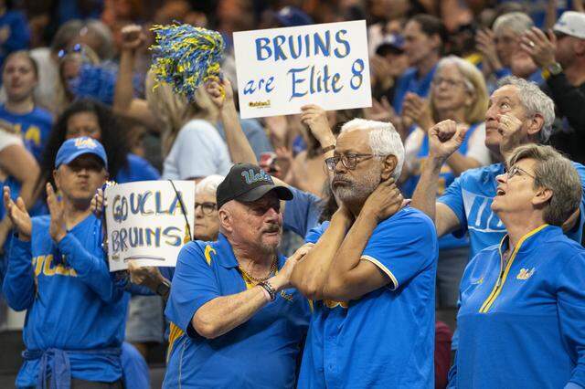 UCLA fans react during the Sacramento Regional 2, part of the March Madness tournament, at Golden 1 Center in Sacramento on Sunday, March 29, 2026.
